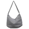 Bolsa de estudiante para el día a día estilo bosque 2026, moderna y de alta gama, bandolera de moda a cuadros estilo Hong Kong, bolsa plisada tipo dumpling