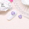 Nail de celebridade da internet Roxo cristal formato pontiagudo diamante Cor super brilhante Coração torto borboleta Vidro roxo diamante grande acessórios