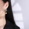 Chapado en oro real de cobre trémolo transmisión en vivo nuevos pendientes de perlas australianas femeninos gas de hada europeo y americano pendientes de madre fritillary pendientes al por mayor