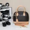 Bolsa de Mão Clássica Popular para Comércio Exterior Couro Genuíno Bolsa Feminina Bolsa Transversal de Ombro de Alta Qualidade Bolsa Feminina Formato Concha Marca Grande Mercadoria de Guangzhou