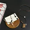 Collar con Colgante de Perro Oso Flocado Lindo para Mujer Cadena de Suéter Cadena de Sudadera de Madera con Forma de Pez y Campana Dulce Fresca Larga Moda