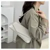 Bolso de alta gama para mujer 2026 nuevo bolso baguette bolso de mano retro bolso de axila bolso pequeño de hombro cruzado para chica de moda