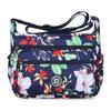 Bolsa de pano de flores Nova bolsa crossbody feminina Pano Oxford Bolsa de mãe de meia-idade e idosa Bolsa Bolsa de ombro multicamadas Bolsa de lona