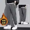 Pantalones para Adolescentes Hombres Otoño e Invierno Forrados de Felpa Engrosados Sueltos Negros Modernos Deportivos con Puño en el Tobillo Pantalones Casuales Pantalones de Chándal para Hombres