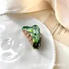 Pinza de garra triangular con patrón de mármol estilo Ins para mujer, sensación de alta gama, pinza de tiburón para recogido a medias degradado, sensación fresca de verano, pinza para moño
