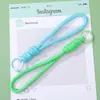 Cordón para teléfono tejido color macarrón con bloques de color, correa de muñeca larga, cordón de pulsera de nailon bicolor hecho a mano para DIY