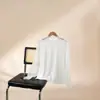 Procesamiento PersonalizadoCamisa Base de Malla Patchwork de Cuello Alto Medio para Mujer con Mangas de Campana Elásticas de Algodón Acanalado