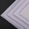 Venta al por mayor 5850 Tela de entretela no tejida lavada en blanco y negro, no deformable, no elástica, para forro de ropa, tela ligera para camisas