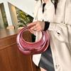 La bolsa popular de este año para mujer 2024 nuevo moda europea y americana color caramelo estilo occidental de muñeca bolsa de acrílico brillante tipo albóndiga