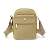 Bolsa de teléfono ligera de lona, minibolso para mujer, estilo nuevo, tela Oxford versátil, bolso de hombro casual para mujer, bolso cruzado