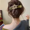 2026 nuevos y elegantes pasadores de pelo de color café al por mayor, pinzas de pico de pato de alta gama para la parte posterior de la cabeza, accesorios para el cabello lindos y dulces para mujeres