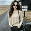 Top de punto asimétrico de dos piezas con mangas largas estilo francés para mujer, nueva colección principios de otoño 2026, top tipo chal de corte ajustado y que favorece la figura