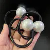 Goma para el pelo grande de perla color champán Banda elástica versátil Anillo para el pelo de celebridad de internet para niñas Cuerda para moño