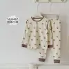 Conjunto de Pijama Infantil Conejo de Pan 2026, Nuevo Otoño/Invierno Lana Elástica Cuello Redondo para Niños Ropa de Casa Conjunto de Top y Pantalones de Otoño