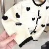 Nueva colección otoño e invierno 2026: Cárdigan de punto elegante, con forma de corazón, de manga larga, calado, estilo coreano para niñas
