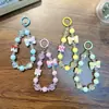 Cadena Creativa para Teléfono Móvil con Lazo y Perlas Llavero Lindo Colgante para Bolso Pareja Regalos Pequeños Al por Mayor