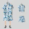 Camisa floral de manga corta, Ropa de playa de Hainan, Estilo hawaiano de Sanya, Conjunto de pantalones cortos finos de verano para hombre y pareja de viaje a Tailandia
