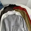 Roupa íntima moderna com botões, gola semi-alta, blusa base de malha com borda franzida, top elegante de corte justo que te deixa mais magra