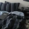 Juego de cuatro piezas funda nórdica para dormitorio de estudiante estilo celebridad de internet sábana funda nórdica juego de tres piezas funda nórdica sábana suministros al por mayor fábrica transfronteriza