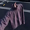 Chaqueta de Hombre Venom Negra Desconstruida con Cuello Alto Otoño Estilo Americano Tres Pruebas Soft Shell Chaqueta de Montañismo Hombro Raglán Chaqueta de Piloto