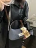 Bolso de Mano Vintage Azul Denim Tipo Dumpling para Mujer 2025 Nuevo Bolso de Hombro Cruzado de Nicho Bolso de Mano para Viajes de Negocios para Mujer Transfronterizo