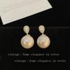 Pendientes de perlas de agua con forma de gota de agua, elegantes, de lujo y ligeros, para mujer, de alta gama, con personalidad y estilo francés, con broche de plata.