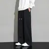 Pantalones casuales para hombre para primavera y verano, nuevo estilo moderno, color liso con logo estampado, estilo perezoso juvenil, pantalones deportivos holgados