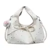 Bolso de mano de nicho moderno estilo coreano para mujer, nuevo de moda primavera 2026, bolso versátil casual para hombro y bandolera