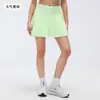 Luxtre Nueva Falda Deportiva de Moda Elástica con Pliegues Refrigerada por Agua de Doble Capa Anti-Exposición Tres Cuartos Dk383