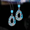 Brincos Europeus e Americanos Retrô Inlaid Turquesa Azul Gota d'Água Exquisitos Acessíveis Luxo High-End Corte Longo Design Recortado Nicho