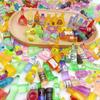 Accesorios de resina con dibujos animados variados, venta al por mayor, funda para teléfono, crema, gel, pinza para el cabello, cuerda para la cabeza, parche para pinza para el cabello hecho a mano