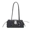 Bolsa baguette de axila para mujer 2026 con fondo negro y lunares blancos, conejo de peluche con colgante de estrella plateada, bolso de mano largo