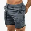 Cross-border Muscle Fitness Masculino Shorts Esportivos Malha Fina Quick-drying Casual Running Training Respirável Calças de praia respiráveis