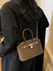 Moda Transfronteiriça Tendência Design de Nicho Bolsa de Axila para Mulheres 2026 Novo Estilo High-End Ombro Transversal Casual Bolsa Concha