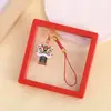 Colgante para teléfono móvil de danza del león de bendición, accesorio para bolso y llavero de coche, colgante auspicioso de hilo rojo estilo chino, disponible para venta al por mayor