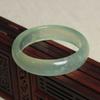 Direto da fábrica Pulseira de jade Xiuyan Fundo de gelo de jade Xiuyan Flor flutuante verde Pulseira de jade edição de colecionador feminina Fornecimento ao vivo