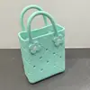 Bolso Perforado de Moda Eva 2026 Nuevo Bolso de Mano Transfronterizo Dopamina Francés Impermeable Almacenamiento Bolso de Playa de Mano