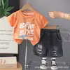 Conjunto de Dos Piezas de Manga Corta de Verano para Niños 2026 Nuevo Ropa de Bebé con Letras y Dibujos Conjunto de Dos Piezas de Mezclilla Cepillada