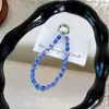Corrente de celular popular com contas quadradas de cristal, pingente de chave, acessório de alta qualidade para capas de celular de meninas, chaveiros de bolsa e pequenos acessórios