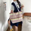 Bolso de Hombro Rayado de Paja de Gran Capacidad 2026 Verano Nuevo Moda Bloqueo de Color Moderno Simple Versátil