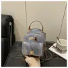 2025 Nueva Tendencia de Otoño Moda de Viaje Simple y Elegante Cadena Hombro Único Doble Hombro Mini Mochila Bolso de Mujer