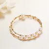 Venta al por mayor de joyería Pulseras de estilo étnico Joyería barroca Suministro de puesto de productos pequeños de Yiwu Pulseras de perlas de agua dulce para mujer