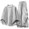 Otoño/Invierno 2026 Nuevo Estilo Desestructurado Remache Moda Versátil Manga Larga Pantalón Largo Top Talla Grande para Hombre Cuello Redondo