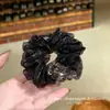 Selección PremiumElásticos elegantes y con estilo, nueva colección de accesorios para el cabello de nicho de alta gama para recoger el cabello en la parte posterior de la cabeza