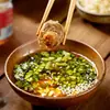 Envío gratis aceite para mojar olla caliente Qiaotou 65ml lata, botella pequeña para uso doméstico, aceite mezcla de verduras, salsa especial para mojar olla caliente