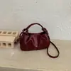 Bolso de mujer diseño de moda nicho 2026 versátil plisado bandolera bolso de mano para ir al trabajo retro nuevo estilo diagonal un solo hombro nube