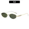 Gafas de sol metálicas de marco pequeño estilo coreano de moda 2026 con un toque de alta gama, estilo influencer moderno, protección UV