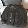 Nuevo conjunto de pijama de dos piezas para mujer estilo coreano de primavera y otoño, rayas blancas y negras vintage, cárdigan con cuello, manga larga, pantalón largo, conjunto casual para casa