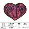 Etiqueta de bordado por computadora recta de fábrica parche de calavera cabeza de fantasma accesorios de ropa de alta gama parche de bordado europeo y americano pegatina de tela
