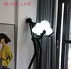 Lámpara de escultura abstracta de bola de personaje Lámpara de sala de exposiciones lámpara de oficina de ventas de hotel Lámpara de decoración artística lámpara de león lámpara de pie con forma humana